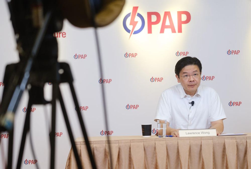 The Peopleu00e2u20acu2122s Action Partyu00e2u20acu2122s Lawrence Wong speaking to party activists at the partyu00e2u20acu2122s headquarters in Bedok. u00e2u20acu201d TODAY pic