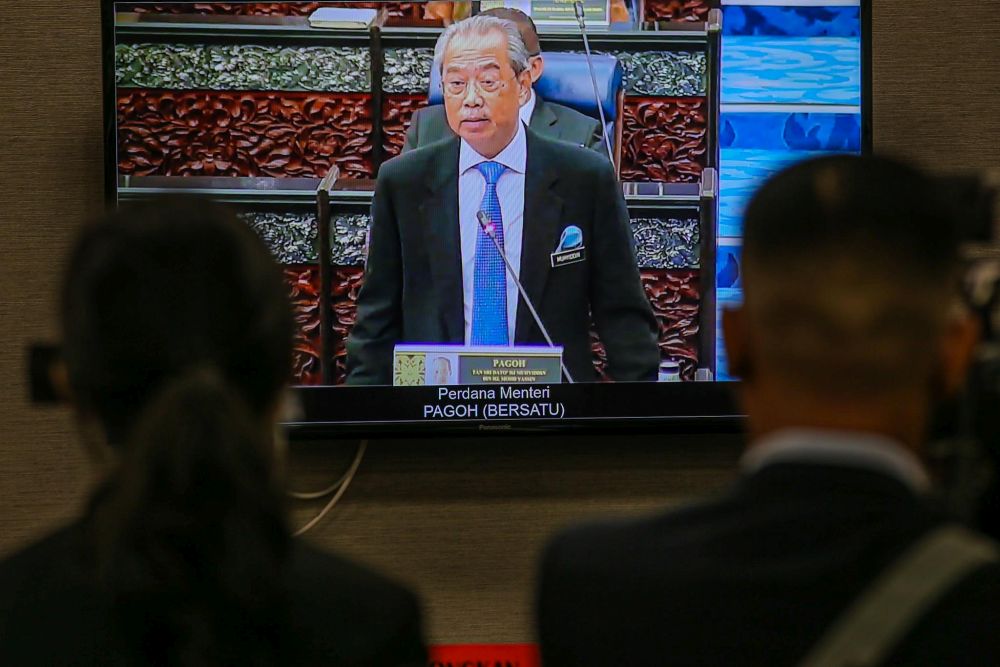 Prime Minister Tan Sri Muhyiddin Yassin delivers his speech during the second meeting of the third session of the 14th Parliament during a live broadcast in Kuala Lumpur July 13, 2020. u00e2u20acu201d Picture by Hari Anggara