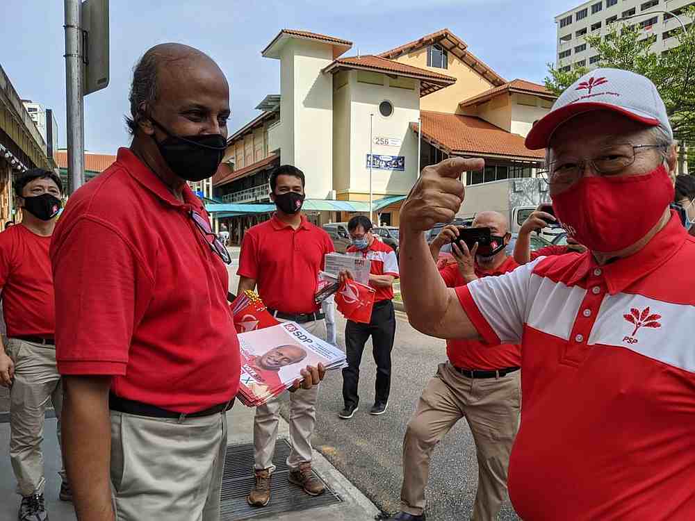 SDP chairman Paul Tambyah (second from left) and PSP chief Tan Cheng Bock (right) met this morning (July 7, 2020) as Tan joined Tambyah on a walkabout in Bukit Panjang in Singapore. u00e2u20acu201d TODAY pic