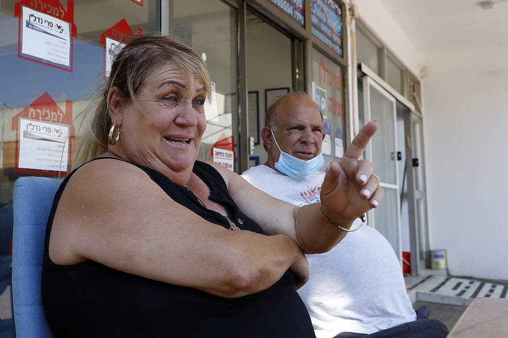 Israelis Perry (left) and Shouki, owners of a real estate agency, in the West Bank settlement of Ariel July 1, 2020. u00e2u20acu201d AFP pic
