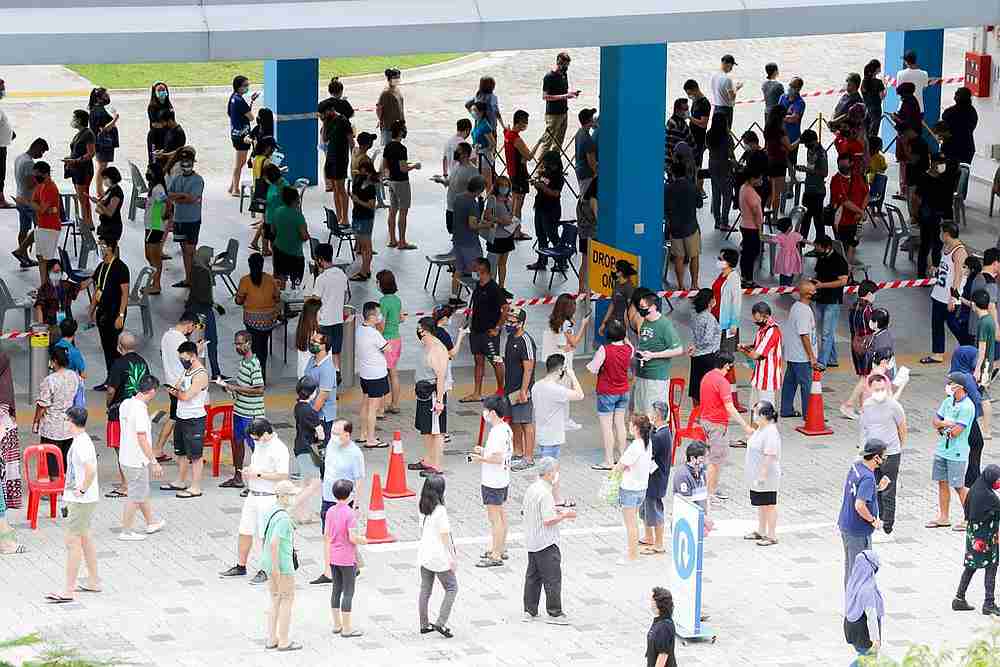 The queue of voters at Dunearn Secondary School polling station in Singapore around 1.40pm on July 10, 2020. u00e2u20acu201d TODAY pic