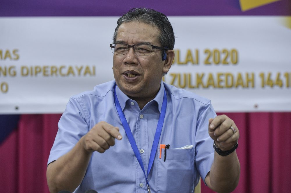 Rural Development Minister Datuk Abd Latiff Ahmad speaks to reporters during a visit to a preschool in Putrajaya July 1, 2020. u00e2u20acu201d Picture by Shafwan Zaidonnn