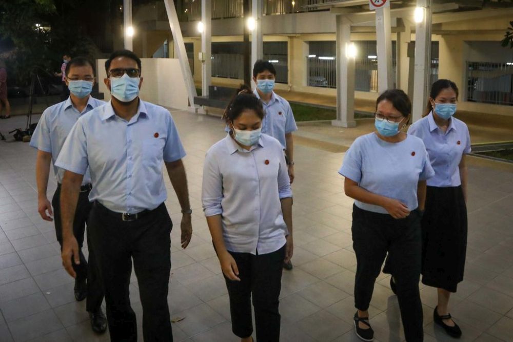 Raeesah Khan (centre) had on Sunday apologised for the posts, saying that it was never her intention to cause any social division but to raise awareness about the concerns of minorities. u00e2u20acu201d TODAY pic