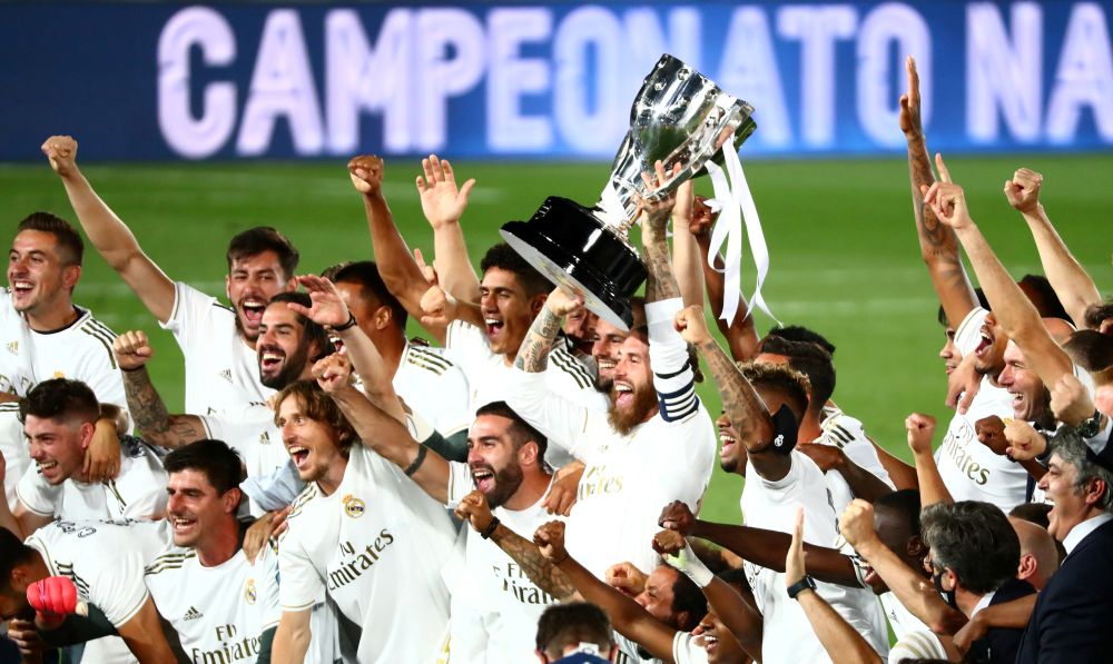Real Madrid's Sergio Ramos and teammates celebrate with the trophy after winning the La Liga at the Alfredo Di Stefano Stadium, Madrid July 16, 2020. u00e2u20acu201d Reuters pic