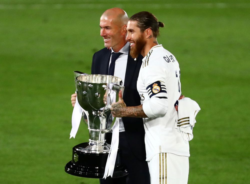Real Madrid's Sergio Ramos and coach Zinedine Zidane celebrate with the trophy after winning the La Liga at the Alfredo Di Stefano Stadium, Madrid July 16, 2020. u00e2u20acu201d Reuters pic
