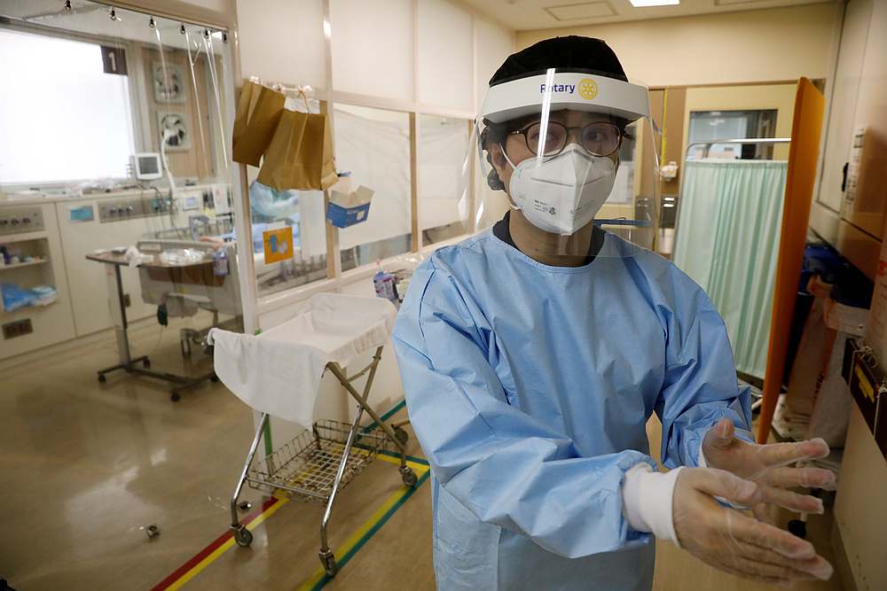 Kentaro Sato, a doctor of Seibu Hospital, wears protective gear at the ICU of the hospital in Yokohama, Japan June 18, 2020.  u00e2u20acu201d Reuters pic