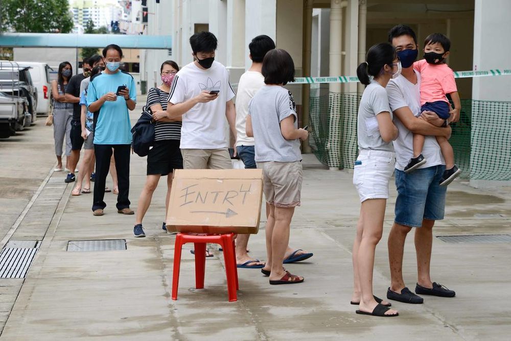 Voters queue outside a polling station at Petir Road on July 10, 2020. u00e2u20acu201d TODAY pic