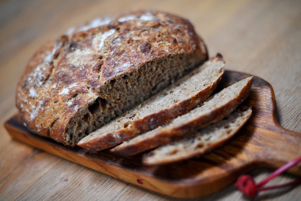A first-attempt at a homemade seeded sourdough loaf is seen on a kitchen table in London, Britain April 3, 2020. u00e2u20acu201d Reuters pic