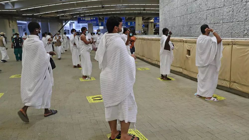 Pilgrims hurl pebbles at a wall symbolising the devil in the last major ritual of the hajj, this year sharply scaled back in the face of the novel coronavirus. u00e2u20acu201d AFP pic