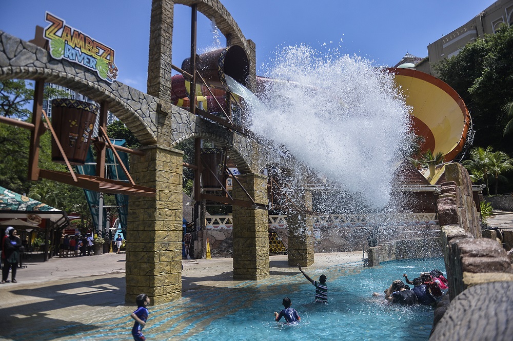 Visitors at the Sunway Lagoon water theme park in Subang jaya on July 4, 2020. u00e2u20acu2022 Picture by Miera Zulyana