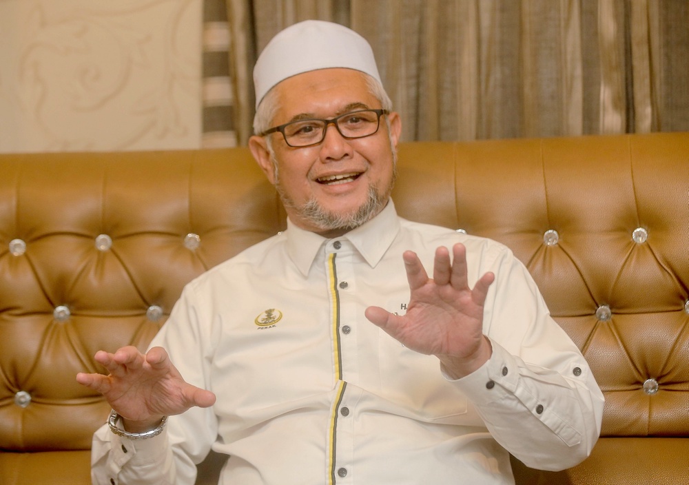 Perak Education, Human Capital, NGO and Civil Society Committee chairman Razman Zakaria speaks to the press at the Perak Islamic Administration Institute in Ipoh August 4, 2020 u00e2u20acu201d Picture by Farhan Najib