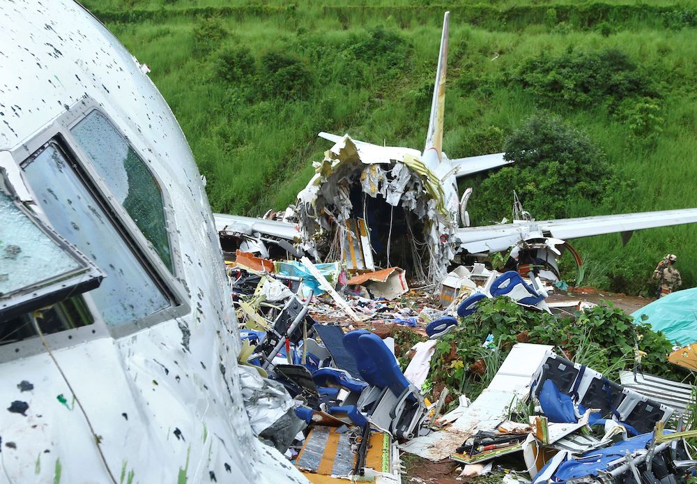 A security official inspects the site where a passenger plane crashed when it overshot the runway at the Calicut International Airport in Karipur, in the southern state of Kerala, India, August 8, 2020. u00e2u20acu201d Reuters pic