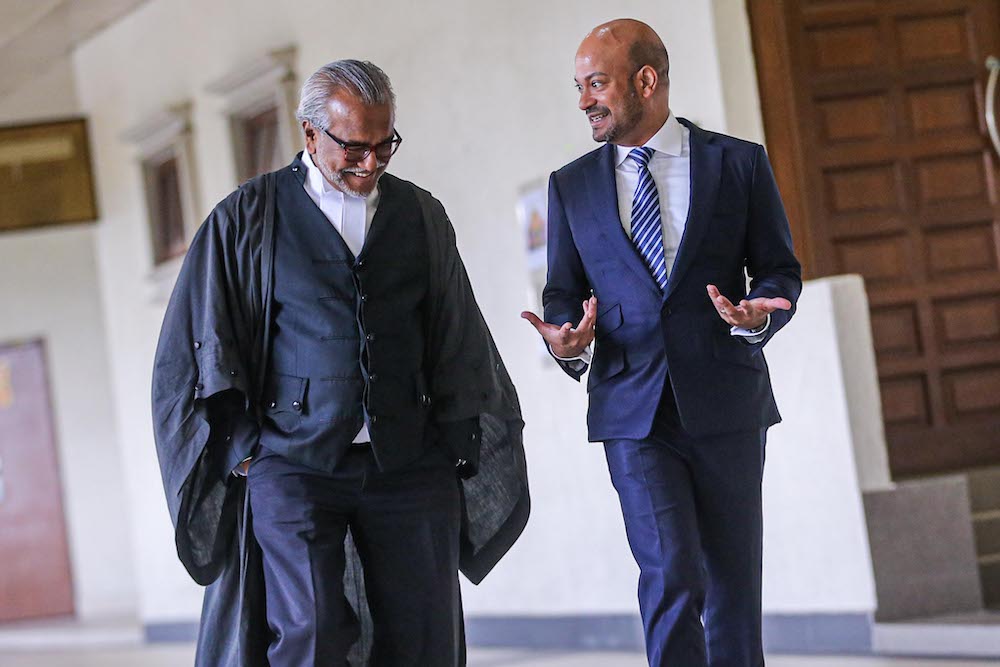 Former 1MDB chief executive Arul Kanda Kandasamy and Tan Sri Muhammad Shafee Abdullah are pictured at Kuala Lumpur High Court, August 10, 2020. — Picture by Hari Anggara