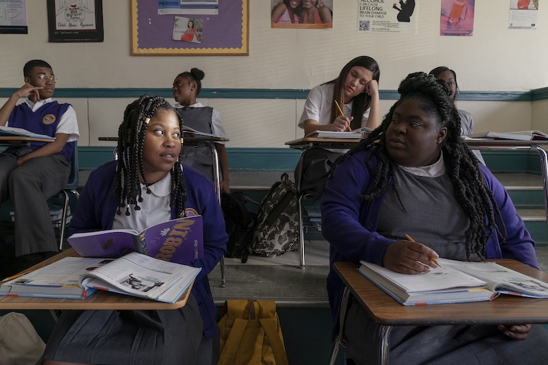 Fishback (left), seen here with rapper Chika in a scene from the film, says she was living a dream acting with the likes of Jamie Foxx and Joseph Gordon-Levitt. — Picture courtesy of Netflix