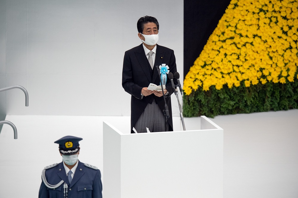 Japanu00e2u20acu2122s Prime Minister Shinzo Abe makes a speech during a memorial service marking the 75th anniversary of Japanu00e2u20acu2122s surrender in World War II at the Nippon Budokan hall in Tokyo August 15, 2020. u00e2u20acu201d Picture by Carl Court/Pool via Reuters