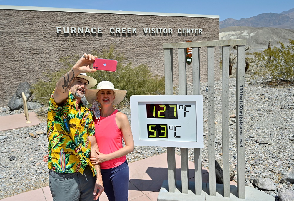 Brian David Bruns, and his wife Aurelia Bruns of Las Vegas take a selfie in front of a thermometer reading 127 degrees Fahrenheit (52 Celsius) at the Furnace Creek Visitors Centre in Death Valley, California August 17, 2020. u00e2u20acu201d Reuters pic