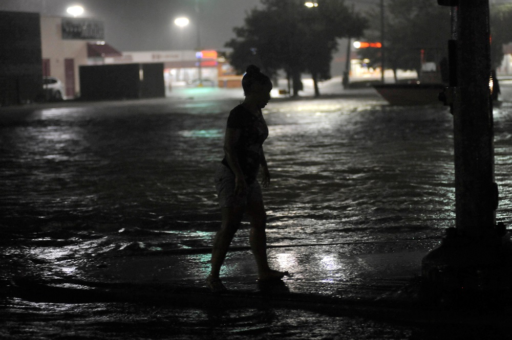 A woman surrounded by floodwater waits to be rescued after Hurricane Harvey inundated the Texas Gulf coast with rain causing widespread flooding, in Houston August 28, 2017. u00e2u20acu201d Reuters pic