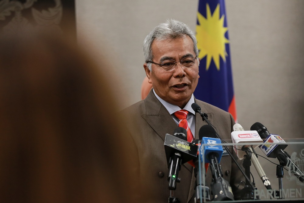 Minister in the Prime Ministeru00e2u20acu2122s Department Datuk Seri Mohd Redzuan Md Yusof speaks to reporters at the Parliament building August 10,2020. u00e2u20acu201d Picture by Ahmad Zamzahurinn