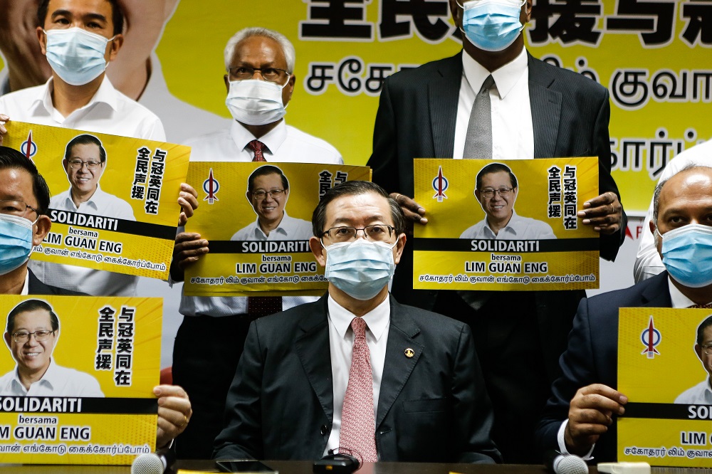 Lim Guan Eng (centre) and his supporters during a press conference in Butterworth August 10, 2020. u00e2u20acu201d Picture by Sayuti Zainudin