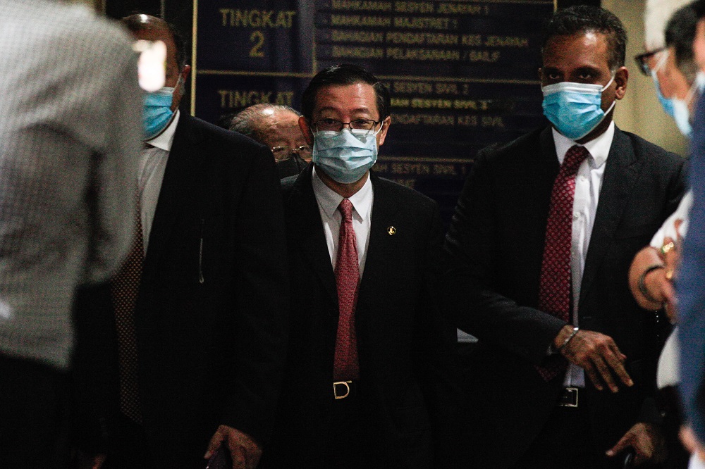 Lim Guan Eng (centre) exits the Butterworth Court Complex August 10, 2020. u00e2u20acu201d Picture by Sayuti Zainudin