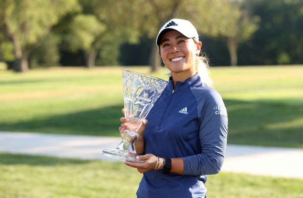 Danielle Kang celebrates with the trophy after winning the Marathon LPGA Classic during the final round at Highland Meadows Golf Club in Sylvania, Ohio August 09, 2020.  u00e2u20acu201d Picture by Gregory ShamusGetty Images via AFP