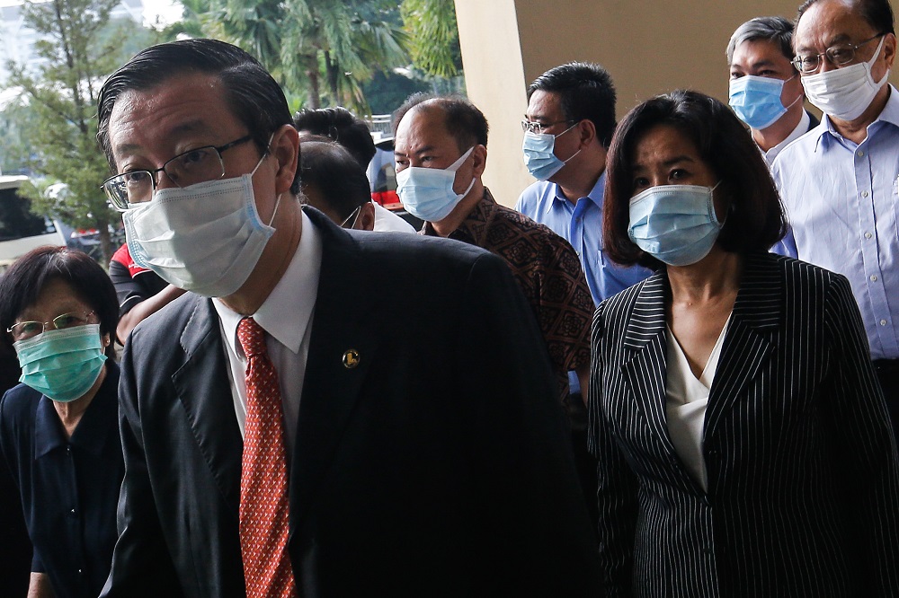 Former Penang chief minister Lim Guan Eng and his wife Betty Chew arrive at the Butterworth courthouse August 11, 2020. u00e2u20acu201d Picture by Sayuti Zainudin