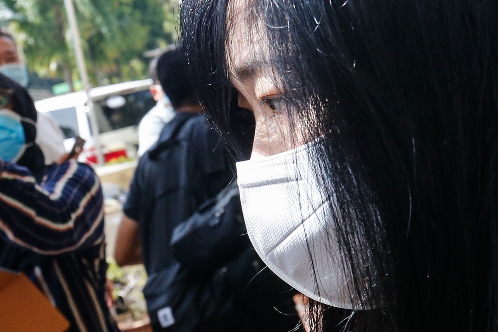 Businesswoman Phang Li Koon is seen leaving the Butterworth Courth Complex August 11, 2020. 
