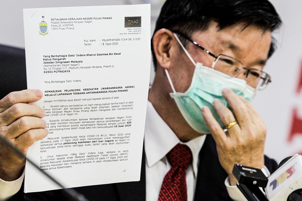 Penang Chief Minister Chow Kon Yeow showing the letter regarding the Medical Tourism during the press conference here at Komtar in George Town August 19, 2020. u00e2u20acu201d Picture by Sayuti Zainudin