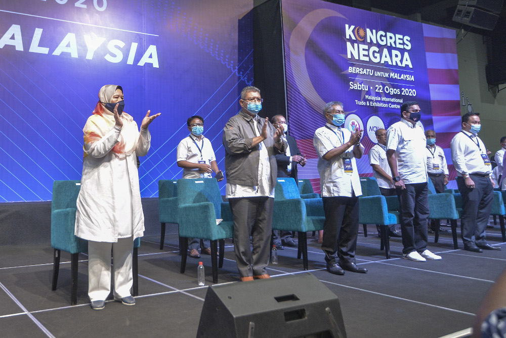 (From left) Zuraida Kamaruddin, Datuk Saifuddin Abdullah and other MPs are seen during the National Congress: Unite For Malaysia event at Malaysia International Trade & Exhibition Centre (MITEC) in Kuala Lumpur, August 22, 2020. — Picture by Shafwan Zai