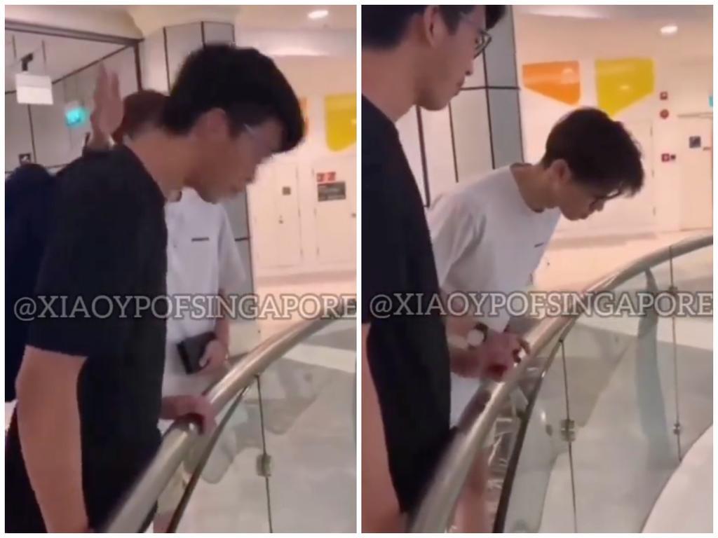 Cai Jiaxu (left) was sentenced to nine months of probation for spitting over the fourth-storey railing at Bugis Junction mall. u00e2u20acu201d TODAY pic