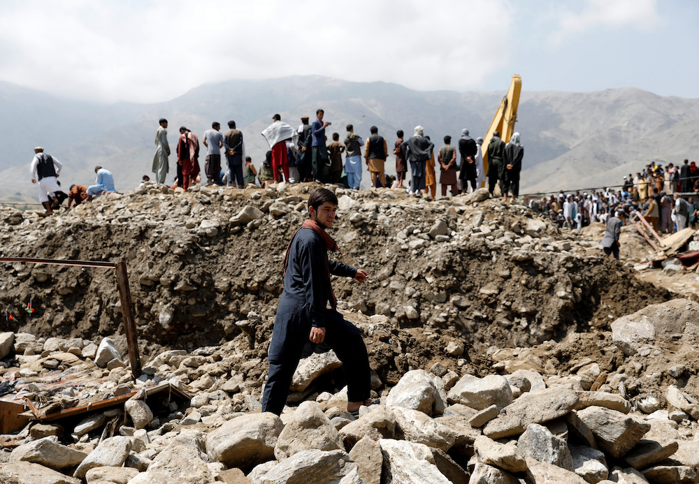 An Afghan man walks at the site after floods in Charikar, capital of Parwan province, Afghanistan August 27, 2020. u00e2u20acu201d Reuters pic
