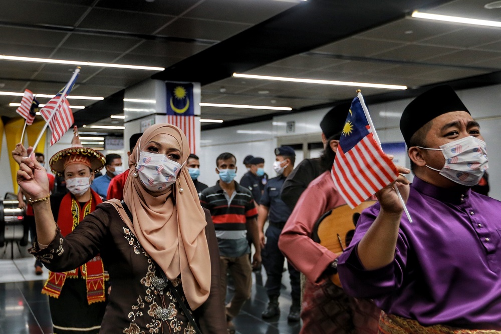 Prasarana staff celebrate Merdeka Day at the Merdeka Station in Kuala Lumpur August 31, 2020. u00e2u20acu201d Picture by Ahmad Zamzahuri