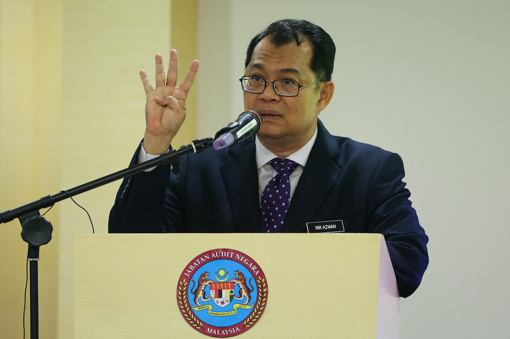 Auditor-General Datuk Nik Azman Nik Abdul Majid speaks during a press conference at the National Audit Department headquarters in Putrajaya August 24, 2020. u00e2u20acu201d Picture by Yusof Mat Isa