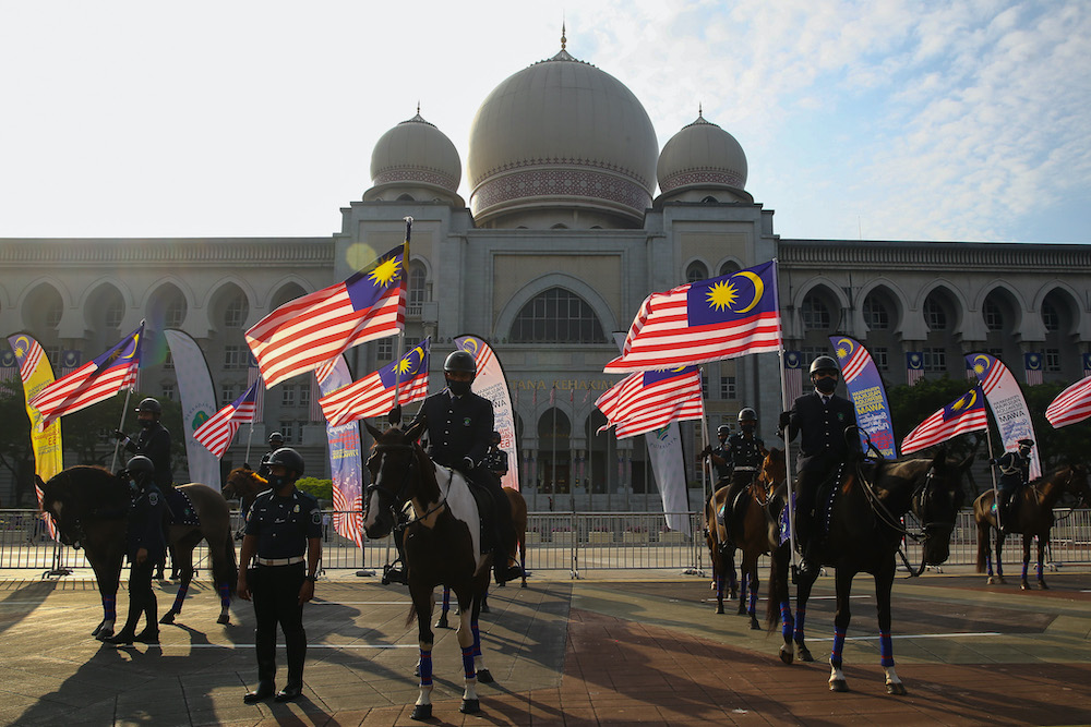 The Civil Servants Horse Contingents take part in a parade in conjunction with Merdeka celebrations and Putrajayau00e2u20acu2122s Silver Jubilee at Dataran Putrajaya August 30, 2020. u00e2u20acu201d Picture by Yusof Mat Isa