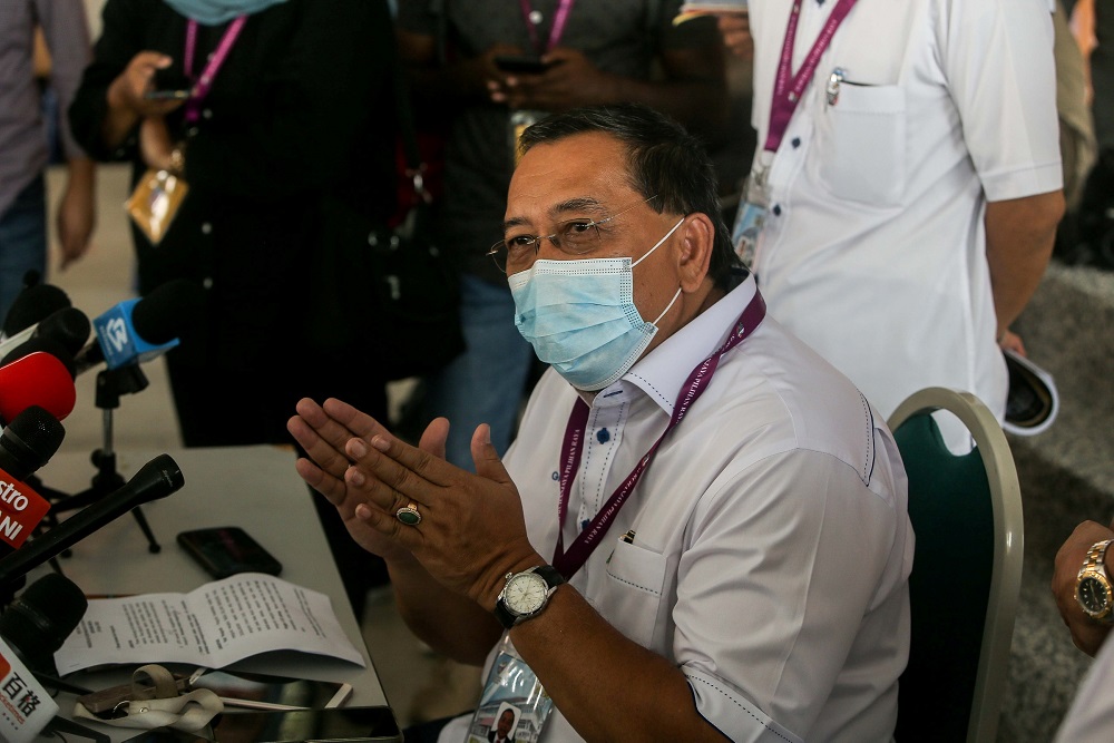 Election Commission chairman Datuk Abdul Ghani Salleh speaks to reporters at the Sekolah Kebangsaan Aminnudin Baki polling station in Slim River August 29, 2020. u00e2u20acu2022 Picture by Farhan Najib