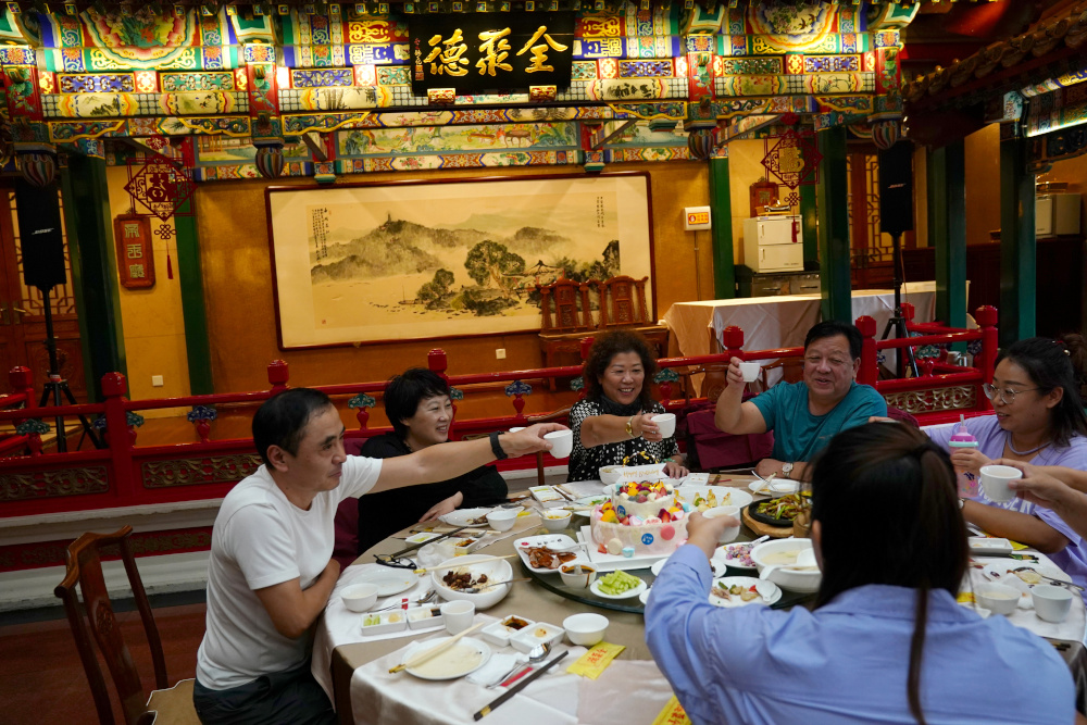 People dine at the Quanjude Peking roast duck restaurant, following the coronavirus disease outbreak, in Beijing, China August 18, 2020. u00e2u20acu201d Reuters pic 