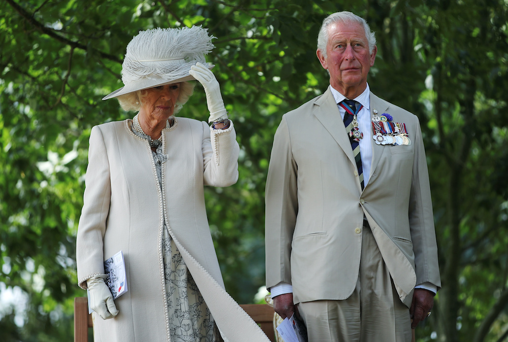 Britainu00e2u20acu2122s Prince Charles and Camilla, Duchess of Cornwall observe a minutes silence at the VJ Day National Remembrance event, held at the National Memorial Arboretum in Staffordshire, Britain August 15, 2020. u00e2u20acu201dReuters picnnn
