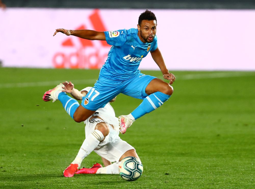 Valencia's Francis Coquelin in action with Real Madrid's Luka Modric at the Alfredo Di Stefano Stadium, Madrid June 18, 2020. u00e2u20acu201d Reuters pic