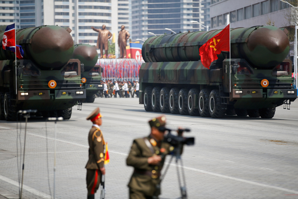 Intercontinental ballistic missiles are driven past the stand with North Korean leader Kim Jong-un during a military parade marking the 105th birth anniversary of countryu00e2u20acu2122s founding father Kim-il Sung, in Pyongyang April 15, 2017. u00e2u20acu201d Reuters pic 