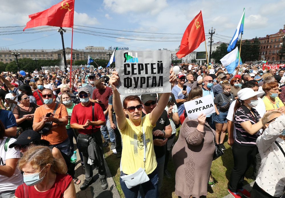 People take part in an anti-Kremlin rally in support of former regional governor Sergei Furgal arrested on murder charges, in the far eastern city of Khabarovsk, Russia August 8, 2020