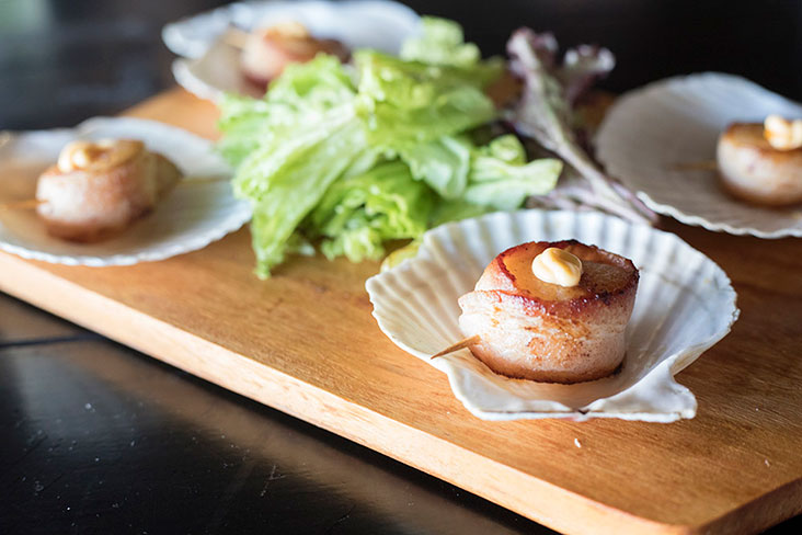 Grilled scallops with bacon at The Bierhaus Senibong Cove
