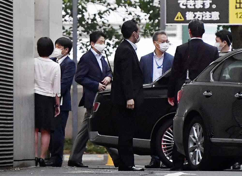 Japanese Prime Minister Shinzo Abe gets into a car as he leaves from Keio University Hospital in Tokyo, Japan August 17, 2020. u00e2u20acu201d Kyodo pic via Reuters