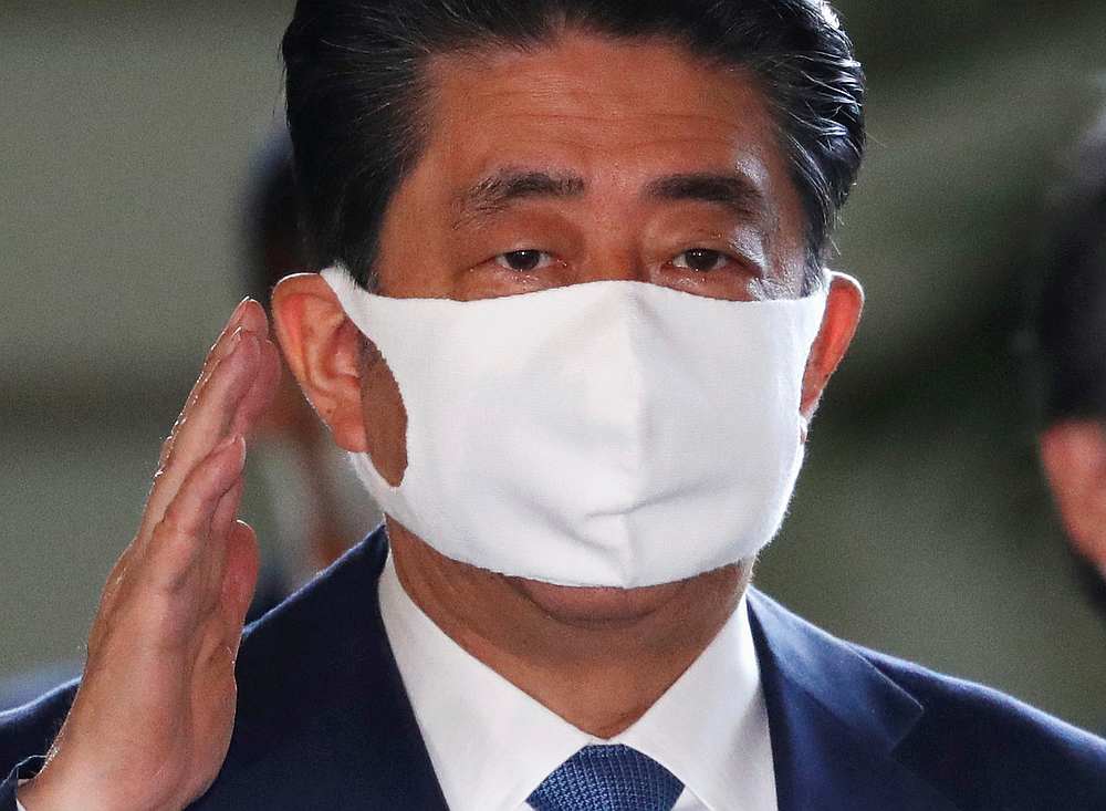 Japan's Prime Minister Shinzo Abe wearing a protective face mask arrives at his official residence, amid the Covid-19 outbreak, in Tokyo, Japan August 28, 2020. u00e2u20acu201d Reuters pic