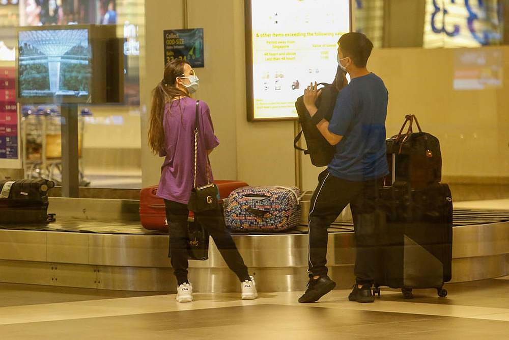 Some outbound travellers from Singapore will be able to claim medical expenses associated with Covid-19 should they develop symptoms within 14 days of their return. u00e2u20acu201d TODAY pic