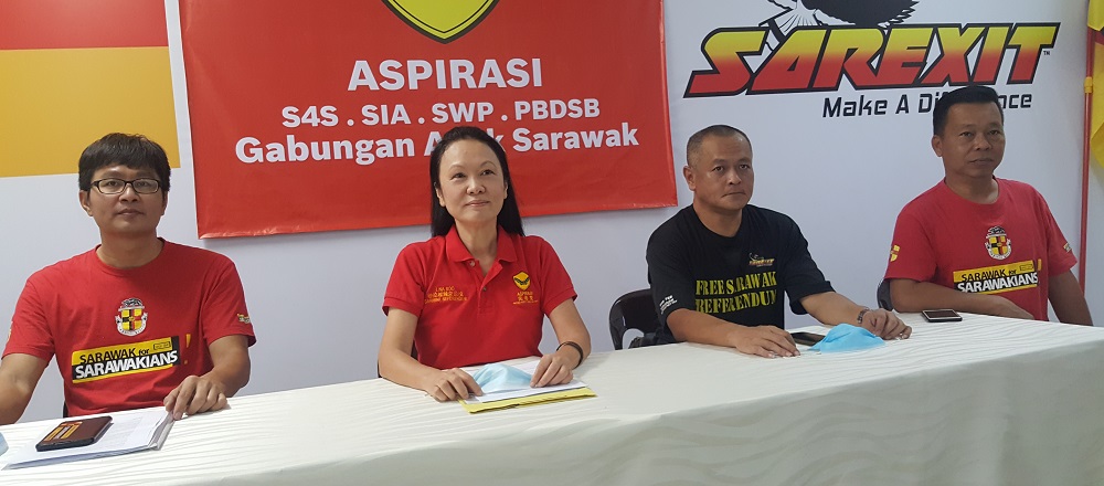 Aspirasi president Lina Soo with stateu00e2u20acu2122s rights activists (from left) Leong Shaow Tung, Chang Chee Hiong and Tan Kok Chiang, August 8, 2020. u00e2u20acu2022 Picture by Sulok Tawie