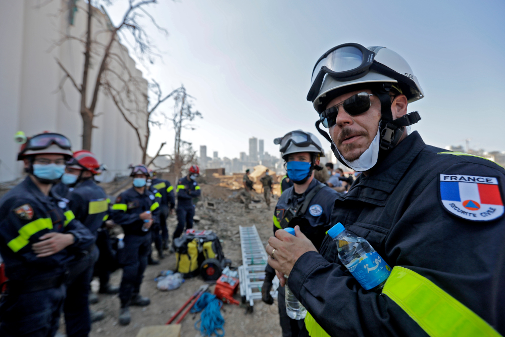French rescue workers are pictured in the devastated Beirut port August 7, 2020, three days after a massive blast there shook the Lebanese capital. u00e2u20acu201d AFP pic 