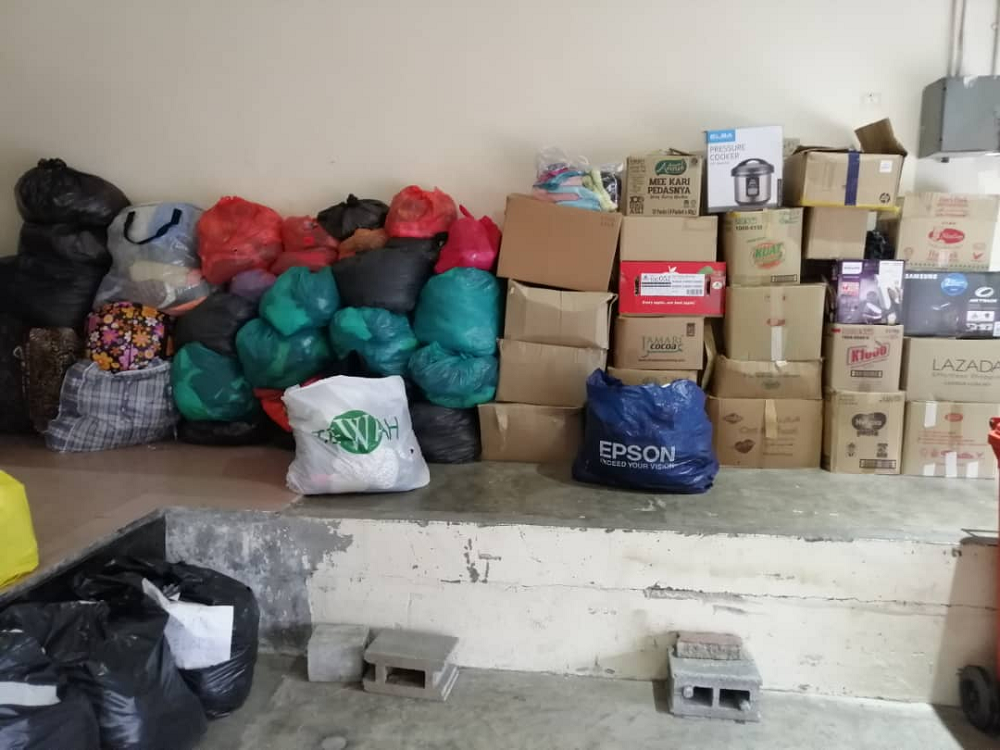 Some three tonnes of used clothing had been received by Persatuan Keluarga Autisme UPM since the association publicised its fundraising project. u00e2u20acu2022 Picture courtesy of Rafidah Sadarudin