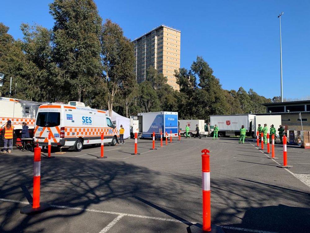 Emergency workers prepare to help residents on day four of a lockdown, amid the coronavirus disease (Covid-19) outbreak, at the public housing tower blocks in Flemington, Melbourne, Australia, July 8, 2020. u00e2u20acu201d Reuters pic