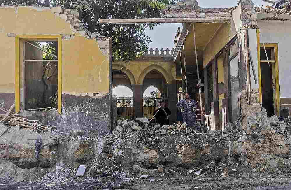 Women residents of a cemetery undergoing demolition stand in the rubble amidst ongoing roadworks at the historic City of the Dead necropolis of Egypt's capital Cairo on July 26, 2020. u00e2u20acu201d AFP pic