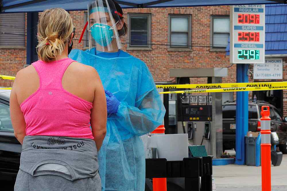 A medical worker administers a test for Covid-19 at a pop-up testing site in Chelsea, Massachusetts  August 7, 2020. u00e2u20acu201d Reuters pic